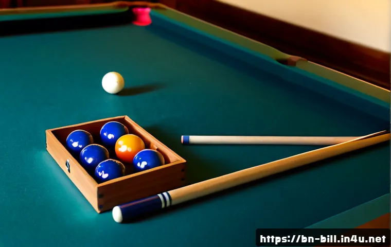 당구 초크 보관법 - Photorealistic close-up of a neat billiards table corner, a small open wooden storage case holding s...